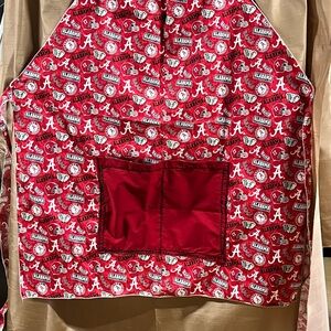 Red Alabama Apron with Pockets, handmade and waiting for you and your party.